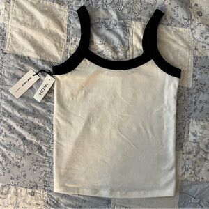 TNA Hold It Sutton Tank Top Aritzia